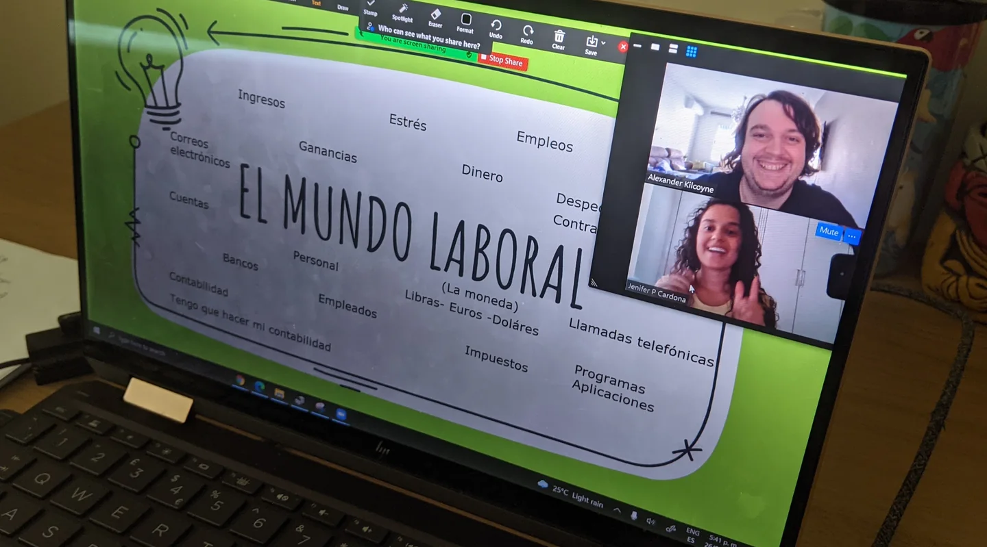 Jenifer guiding an online Spanish activity with a learner on screen